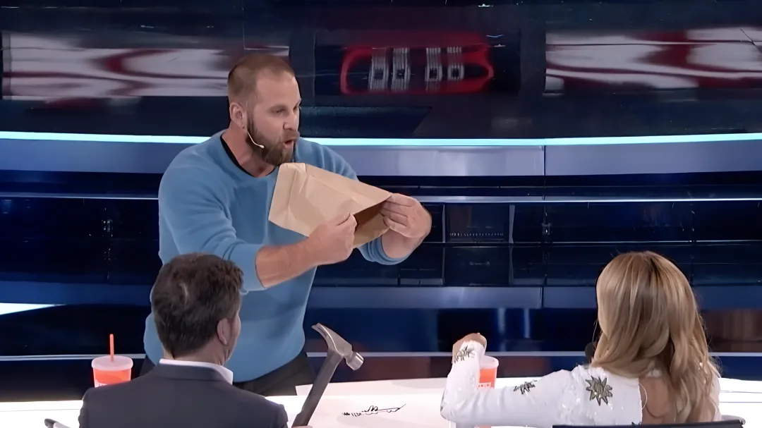 Jon Dorenbos performing card magic during corporate keynote speech on stage