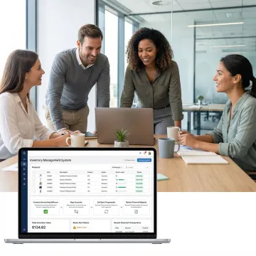 Operations team reviewing inventory system setup and QuickBooks integration on a laptop