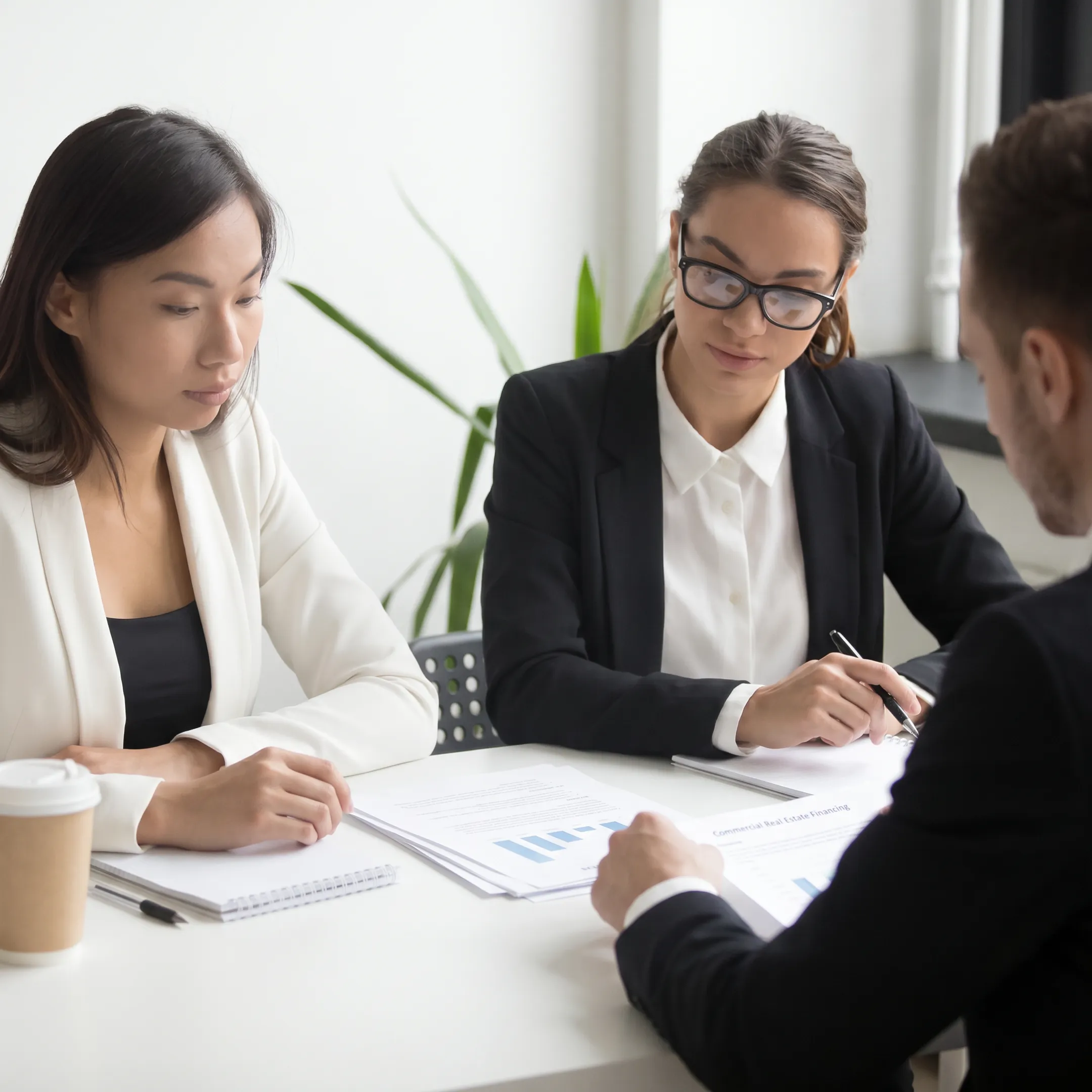 Commercial property financing consultation with real estate investors