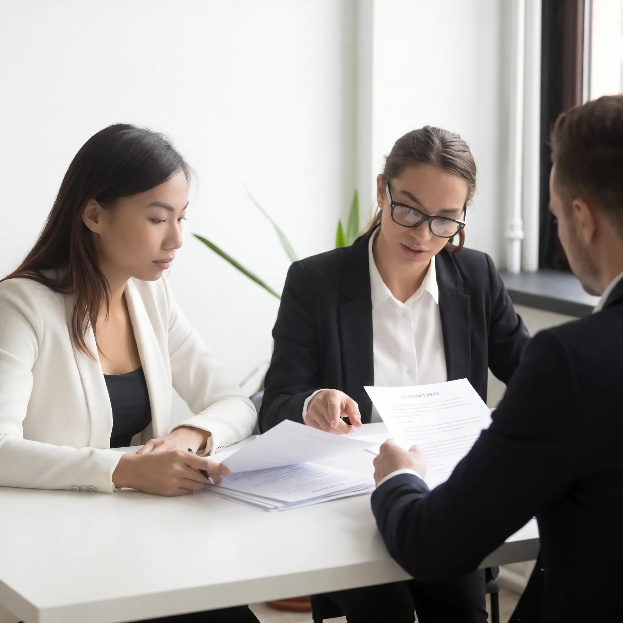 Commercial real estate investor reviewing hard money loan documents