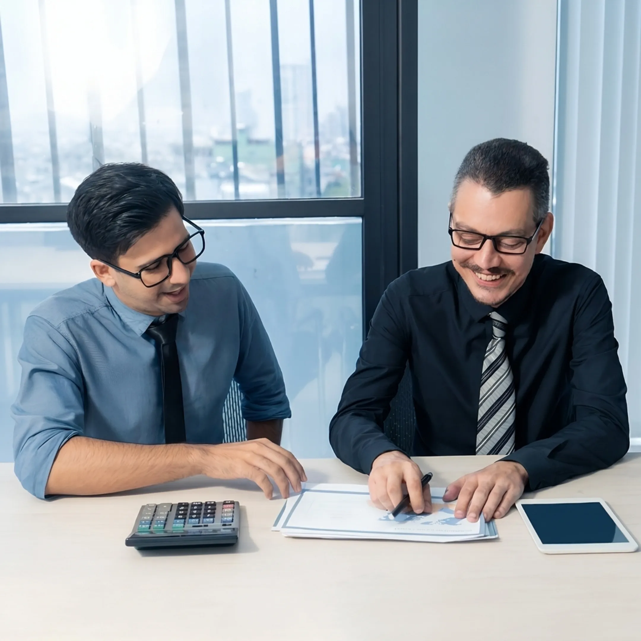 Advisor discussing small business tax planning with business owner
