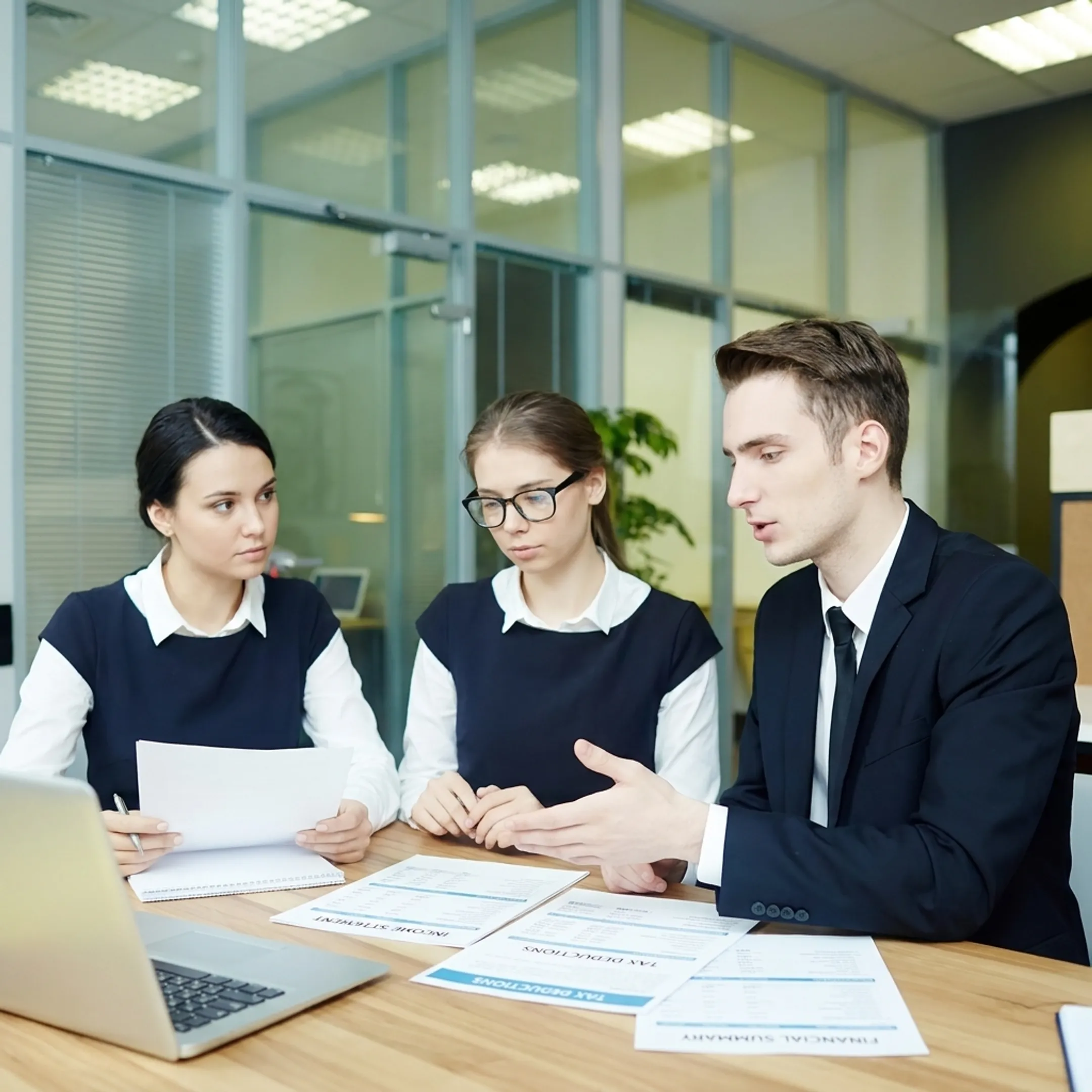 Tax advisor explaining financial planning information to a client