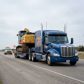 Expedited heavy-haul truck transporting industrial freight