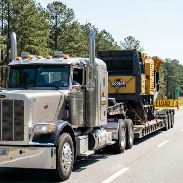 Heavy haul truck transporting oversized equipment in Alabama