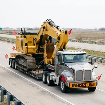 Heavy-haul truck transporting industrial machinery