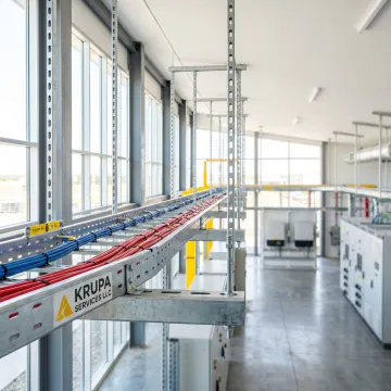 Industrial cable tray system in a renewable energy facility