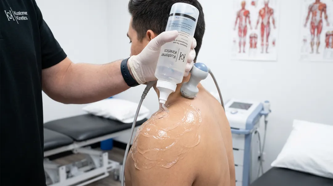 Therapeutic ultrasound couplant gel applied to transducer for physical therapy treatment