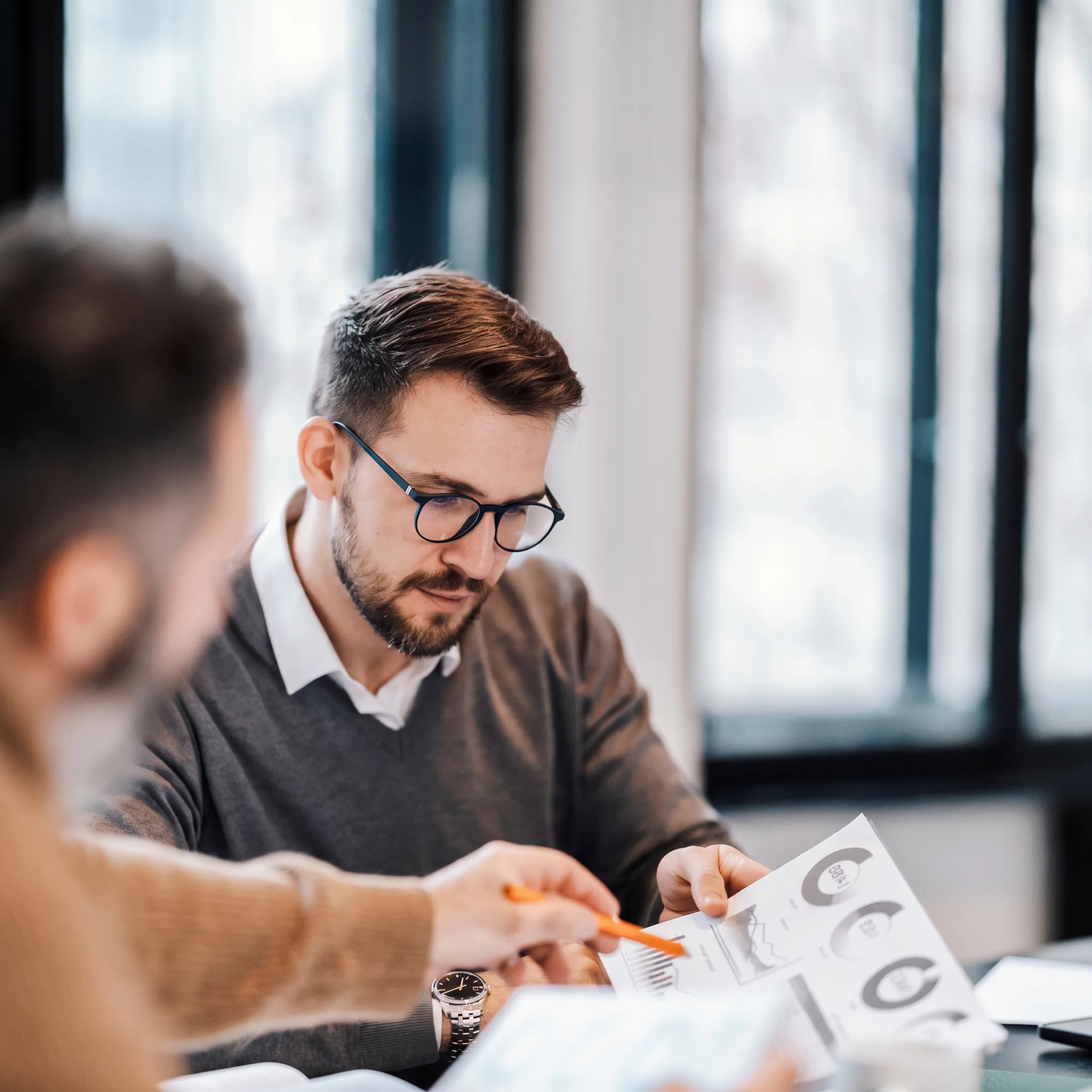Couple discussing financial goals with an advisor
