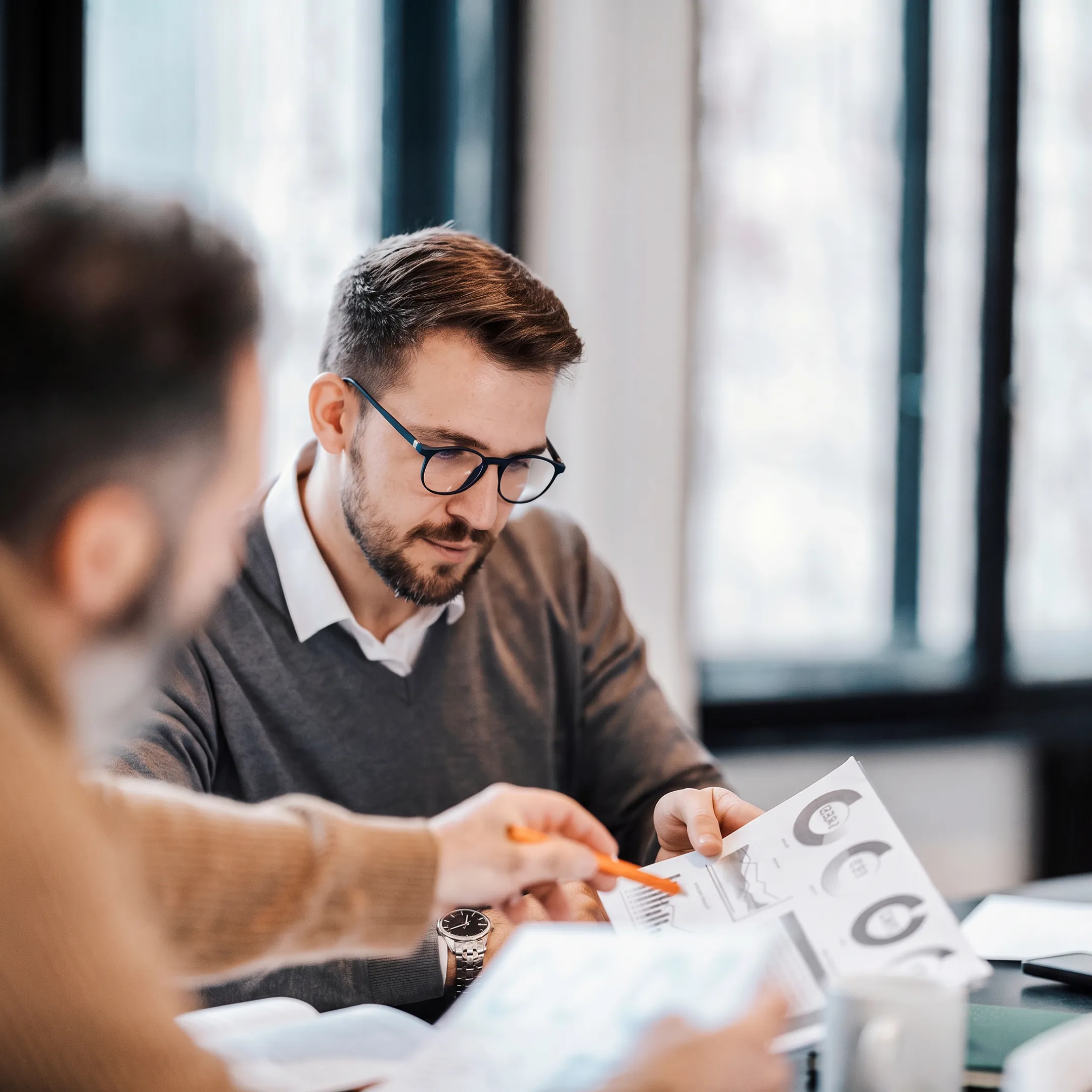 Advisor discussing a personalized investment strategy with a client