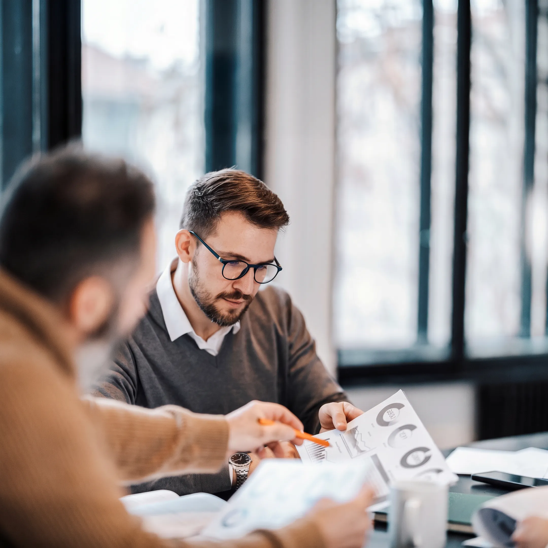 Advisor presenting a personalized portfolio strategy to a client
