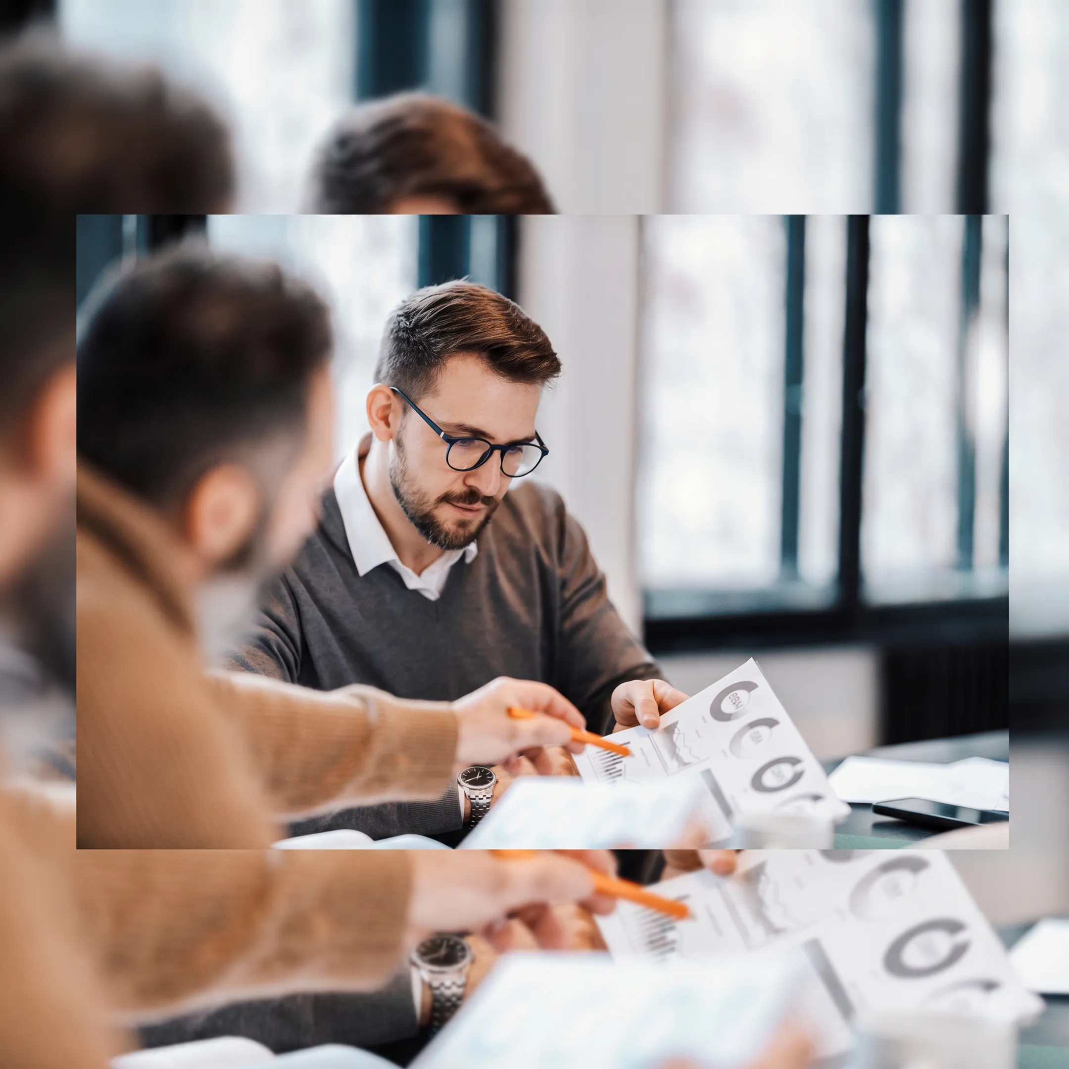 Entrepreneur reviewing a personalized wealth management plan with an advisor
