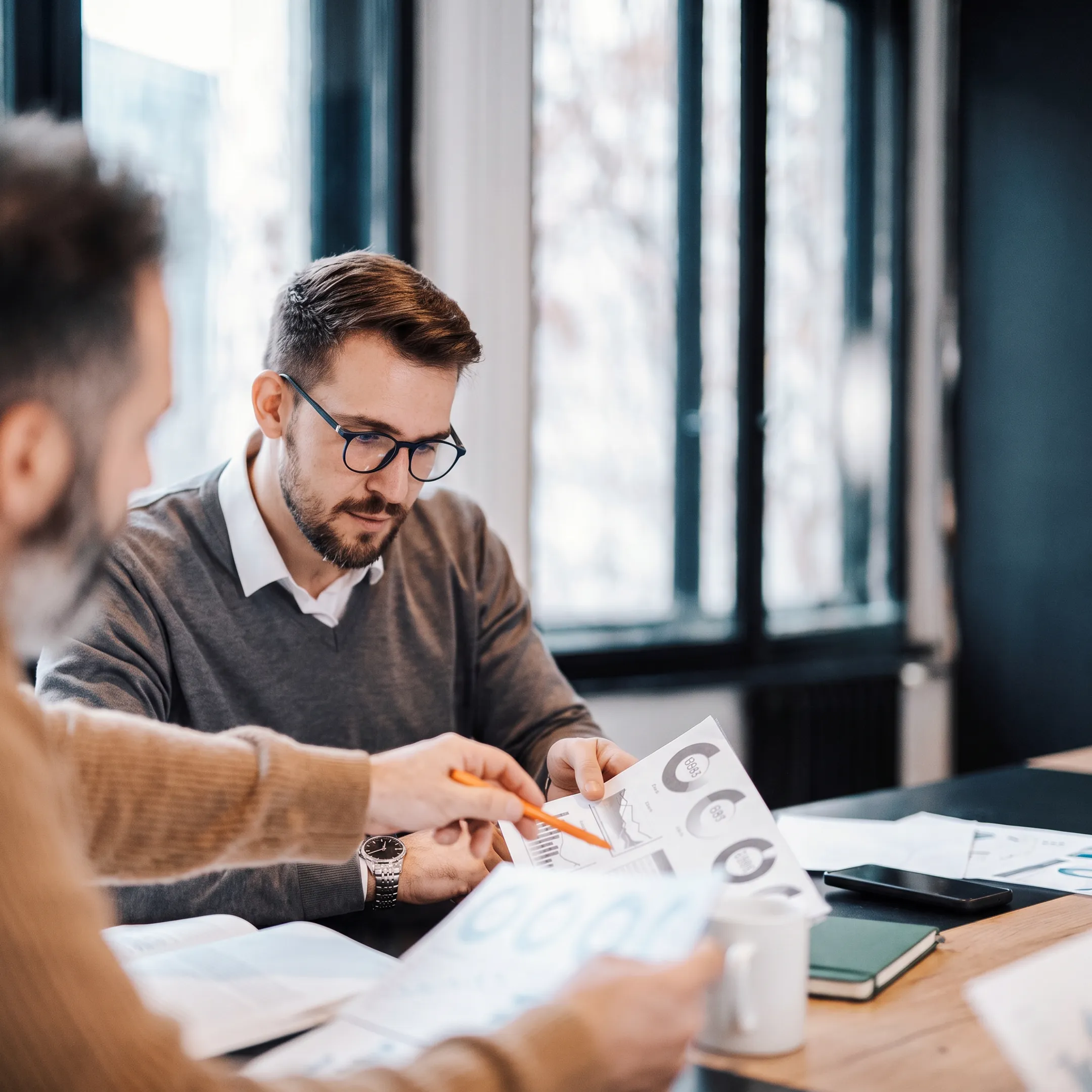 Advisor discussing a customized investment portfolio with a client