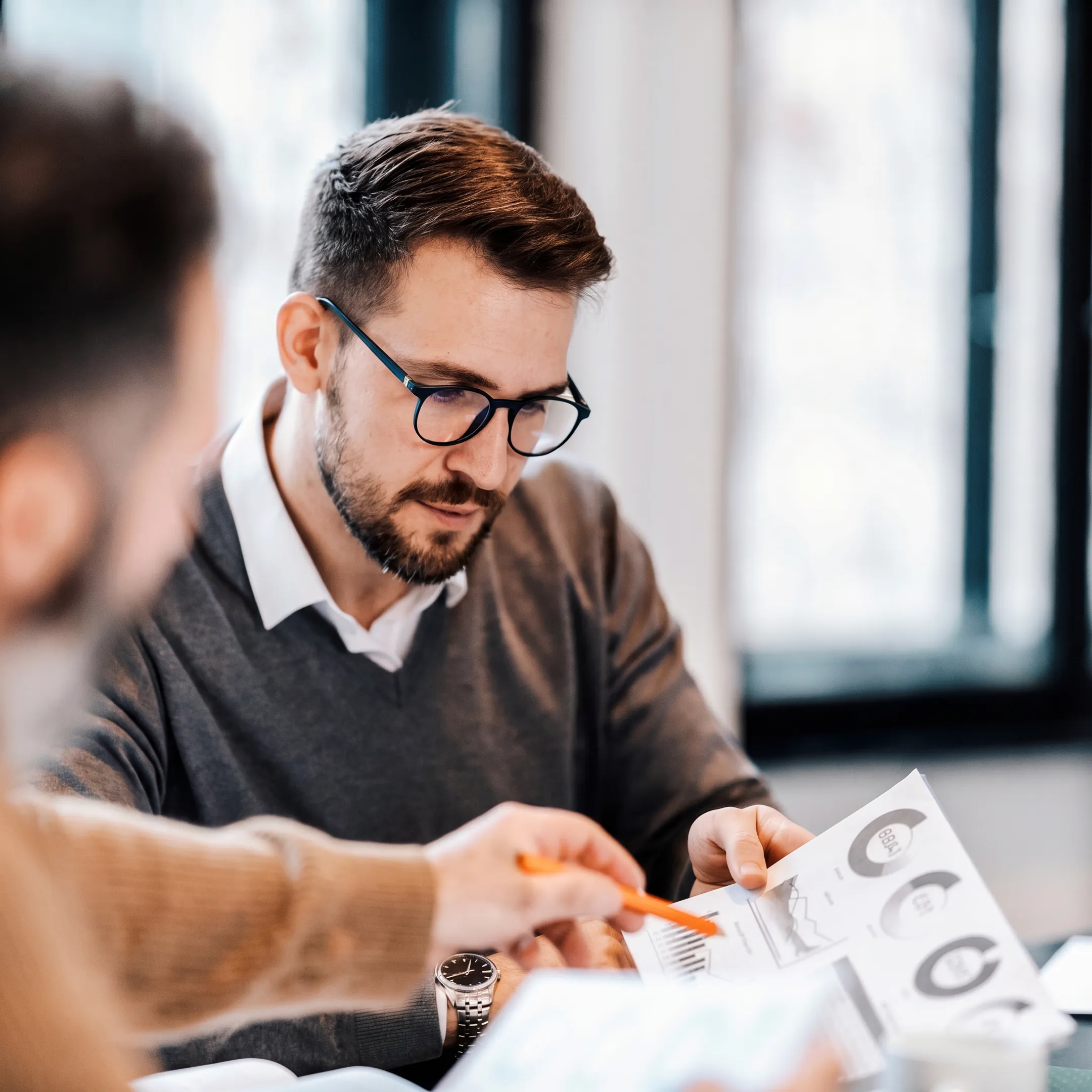 Financial advisor presenting a personalized retirement investment strategy