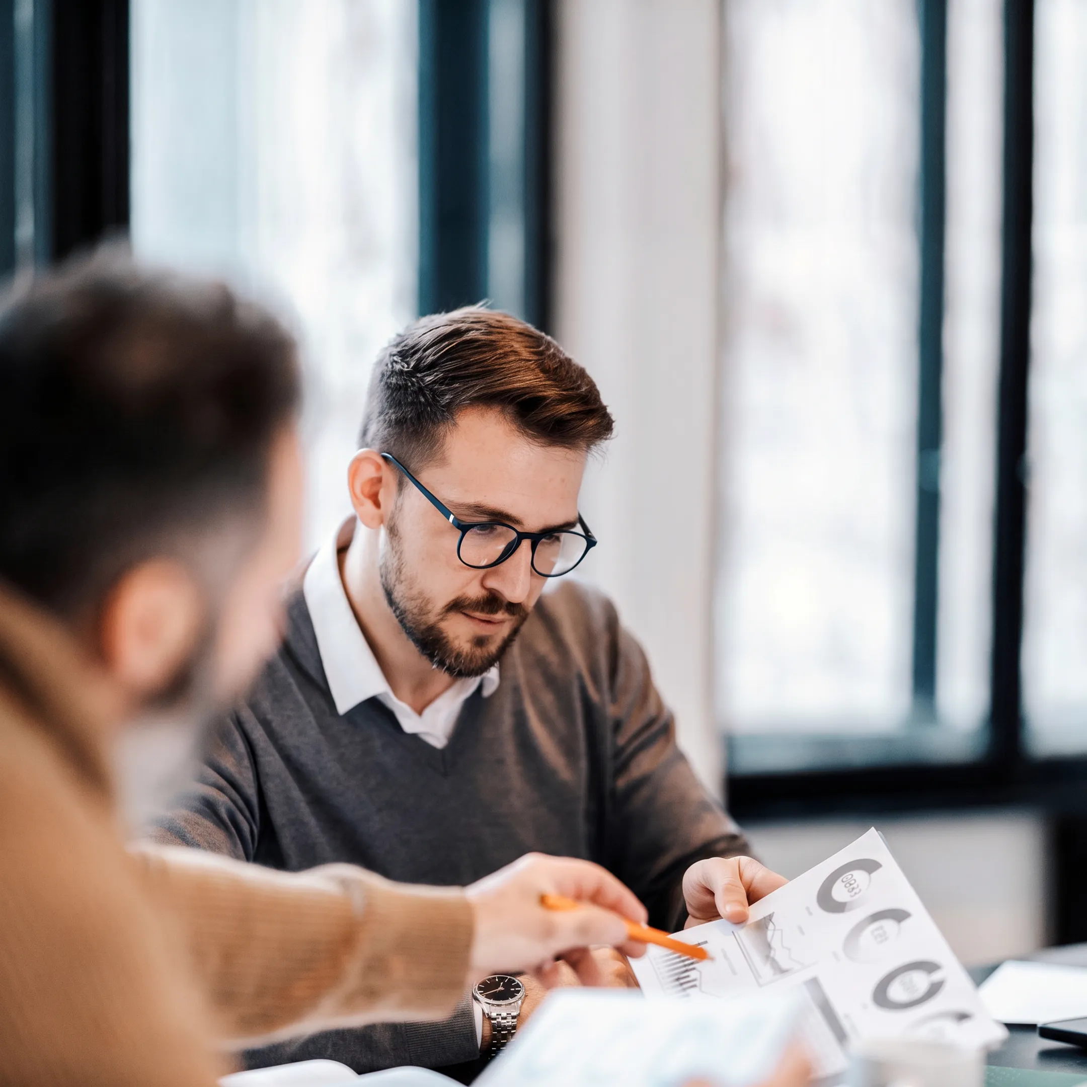 Advisor discussing a personalized wealth strategy with clients