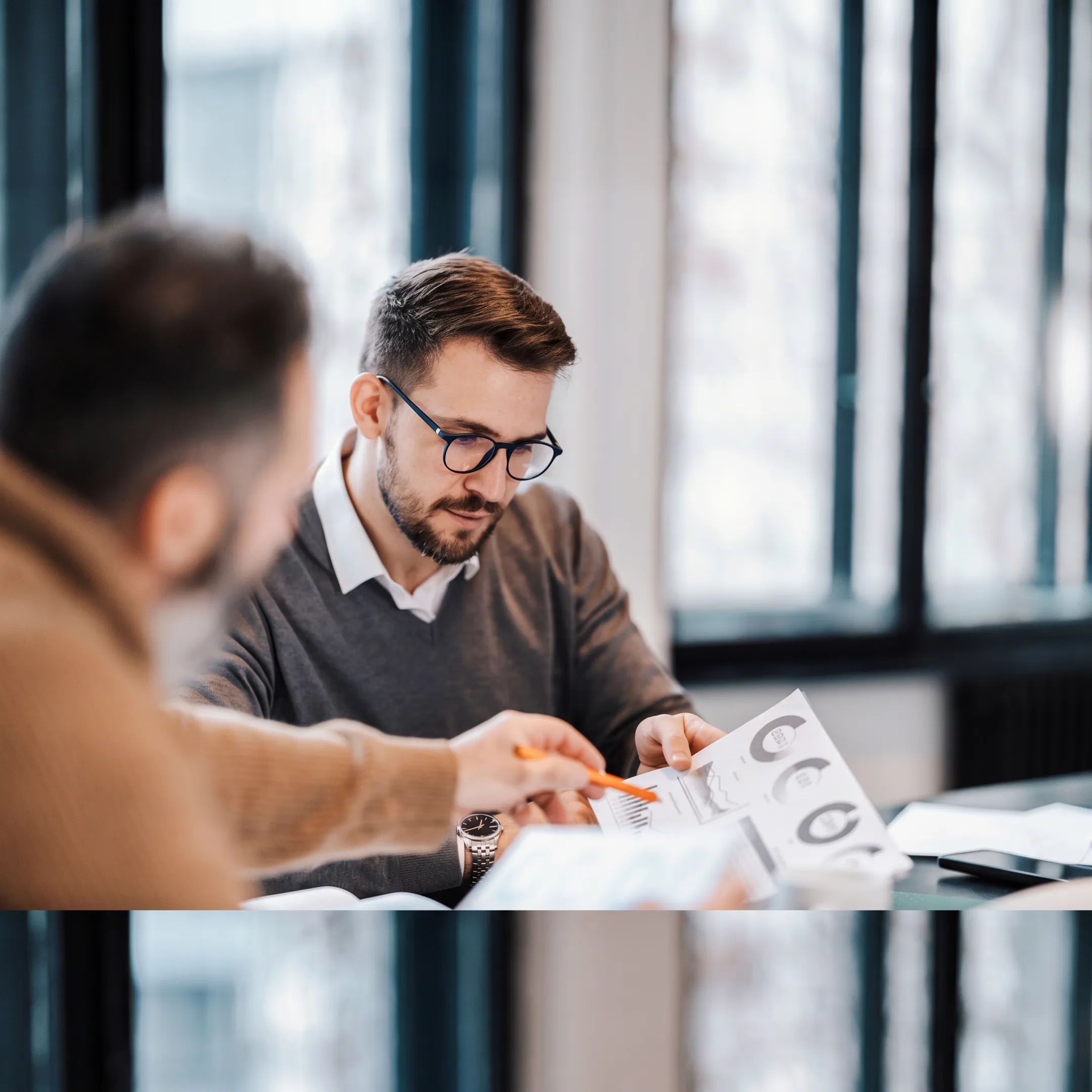 Financial advisor discussing an investment strategy with a client