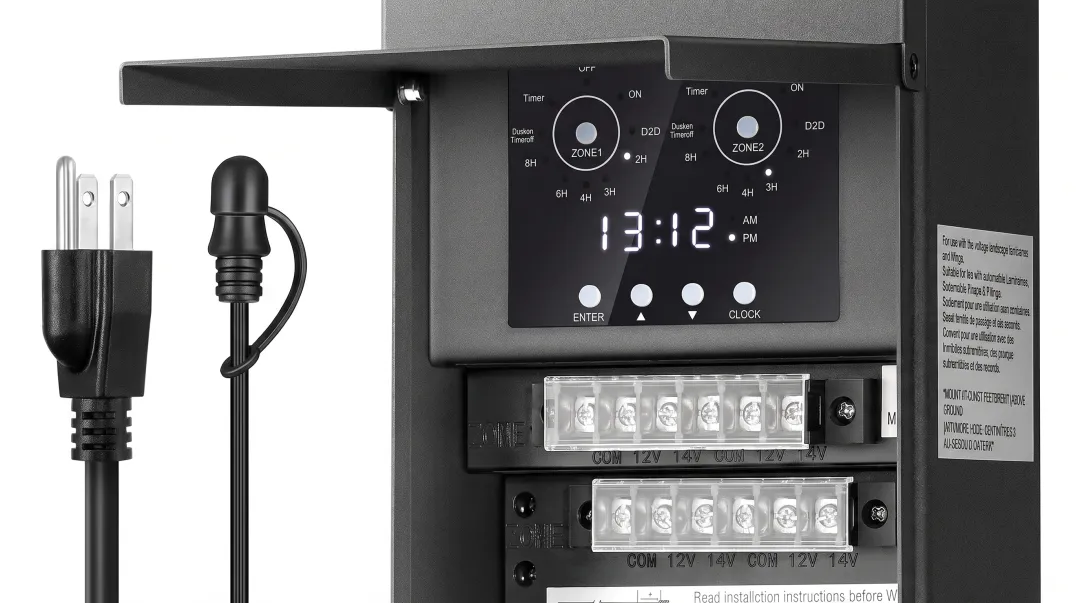 Landscape lighting transformer with dimming controls and timer settings for outdoor systems