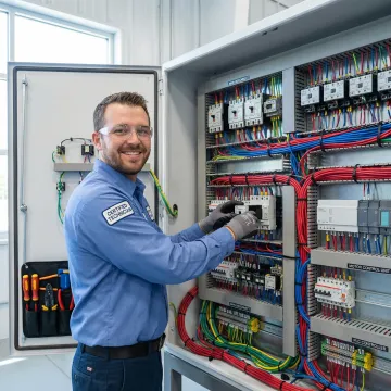 Detailed industrial electrical wiring schematic and installation in progress