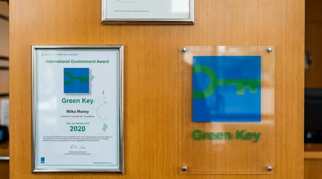 Hotel sustainability certification displaying Green Key or LEED environmental recognition plaque