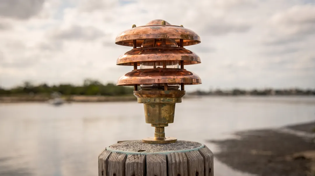 Marine-grade brass dock lighting fixture resistant to salt air corrosion