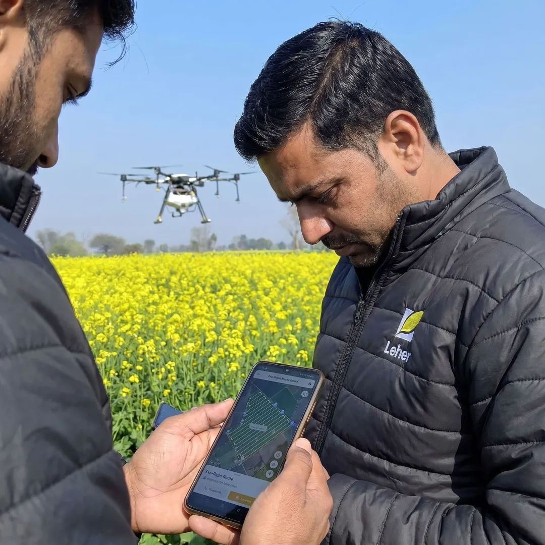 Drone pilot planning a farm spraying route