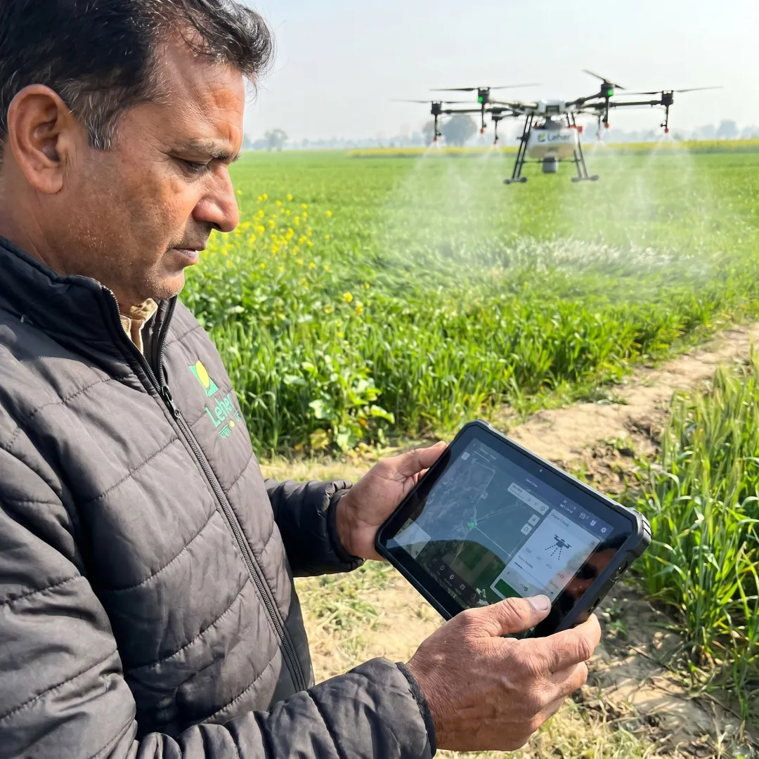 Smart farming drone spraying crops in India
