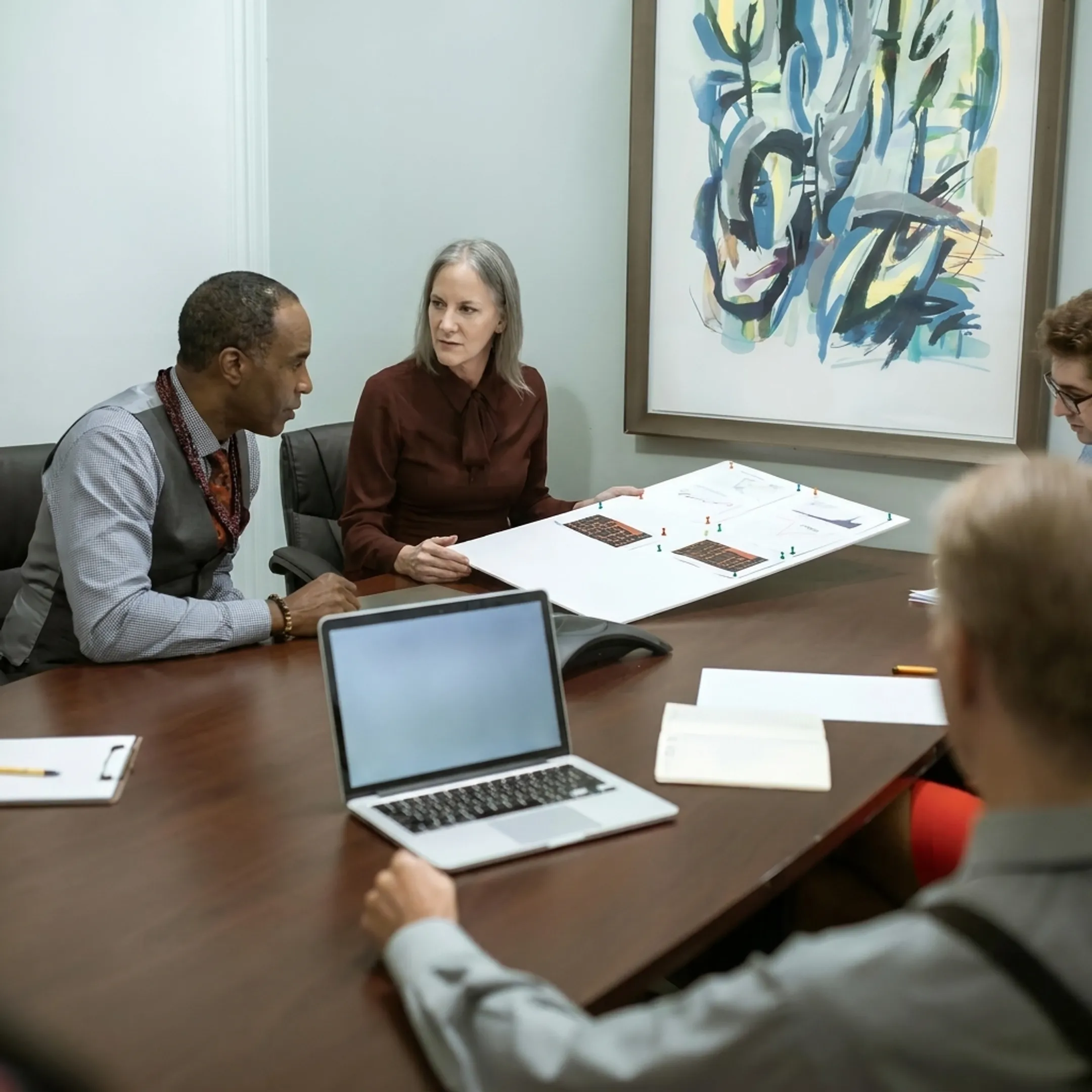 Real estate investor discussing financing strategy