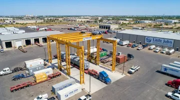 Little John Transportation Services Laredo facility with heavy-haul crane and equipment