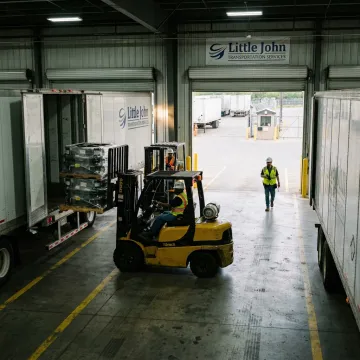 Freight being transferred at a cross-border logistics facility