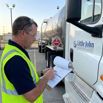 Hazmat freight specialist coordinating regulated shipment