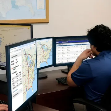 Flatbed freight coordinator planning a shipment