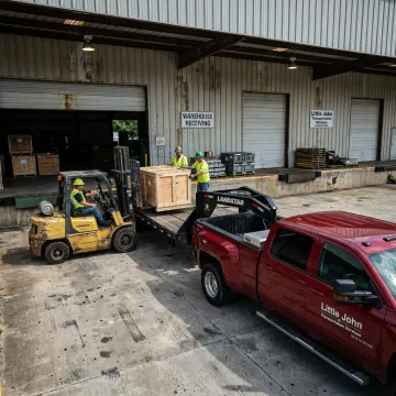 Hot shot truck preparing urgent freight for direct delivery