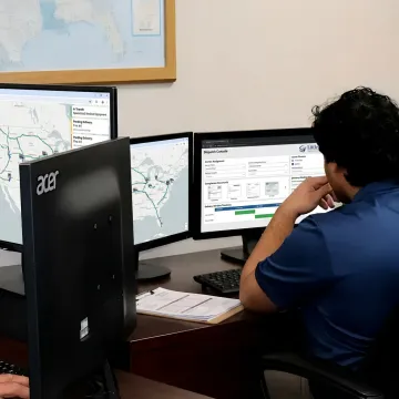 Logistics team tracking a white glove freight shipment