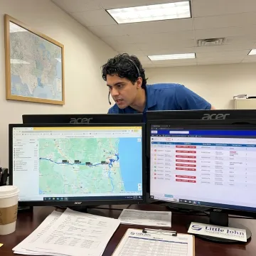 Dispatcher tracking urgent freight shipment