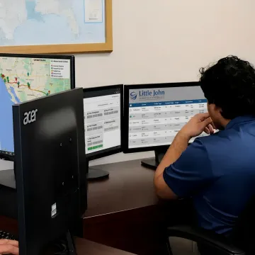 Dispatcher tracking container truck movement