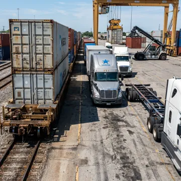 Intermodal containers being transferred near a rail terminal