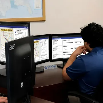 Flatbed freight specialist planning a shipment