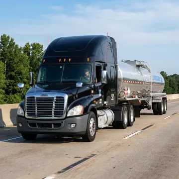 Chemical tanker truck hauling regulated freight