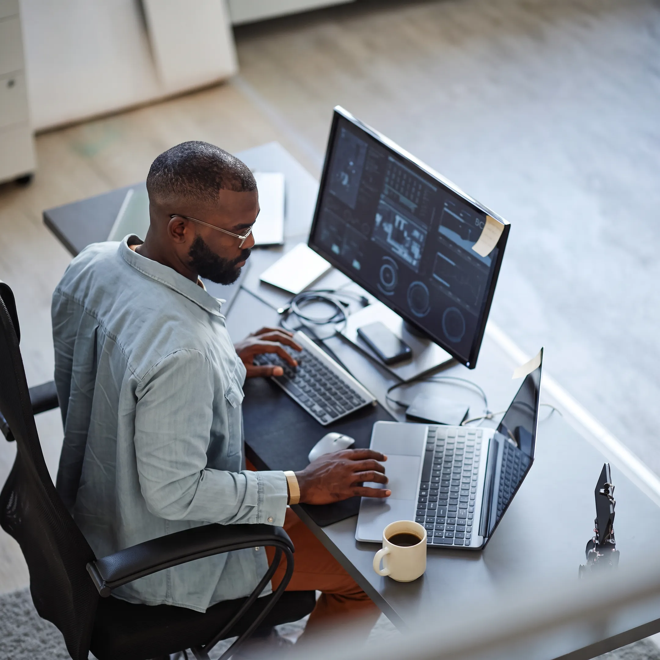 Cybersecurity analyst monitoring business network threats