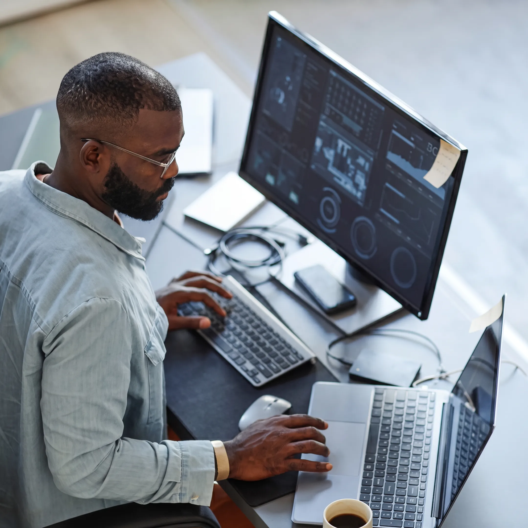 IT professional monitoring a business network