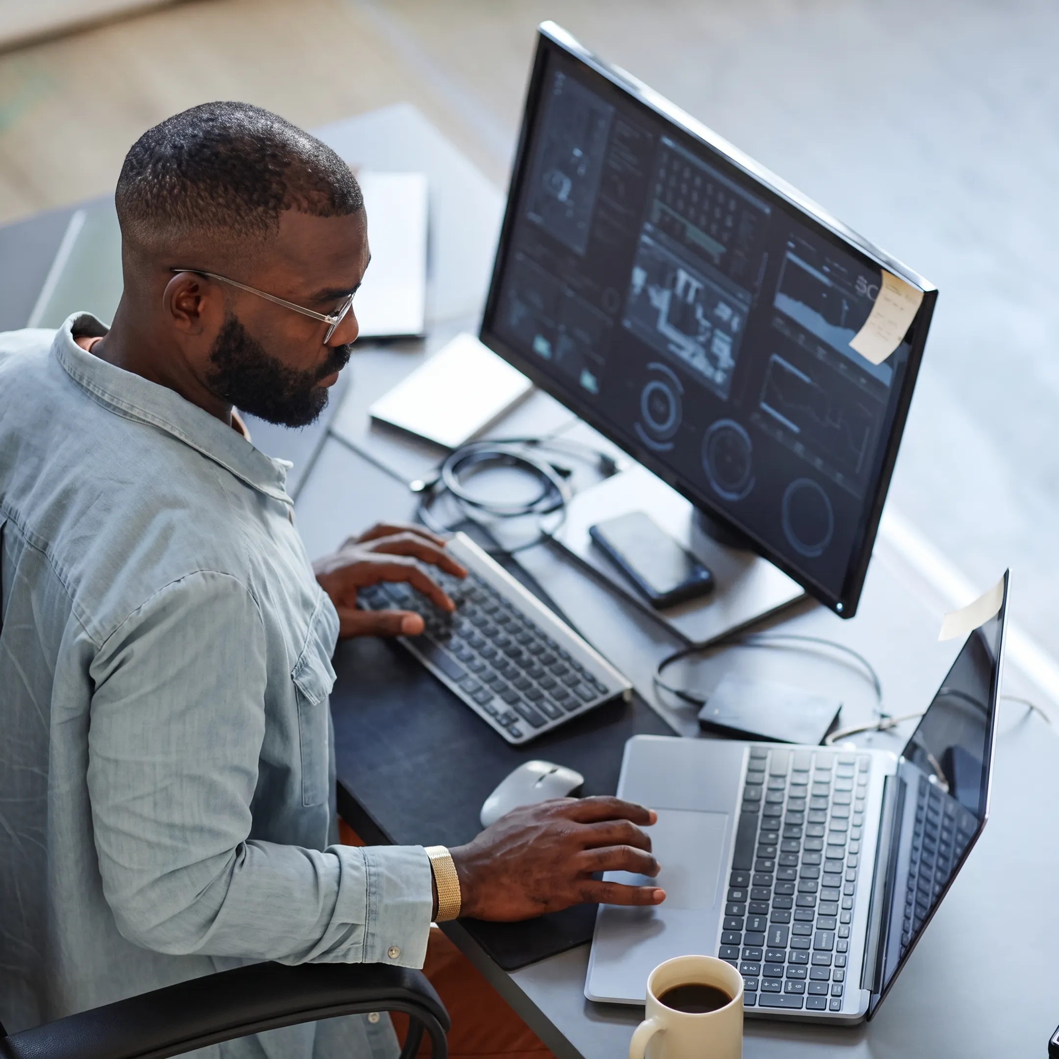 Technician reviewing managed cybersecurity protections