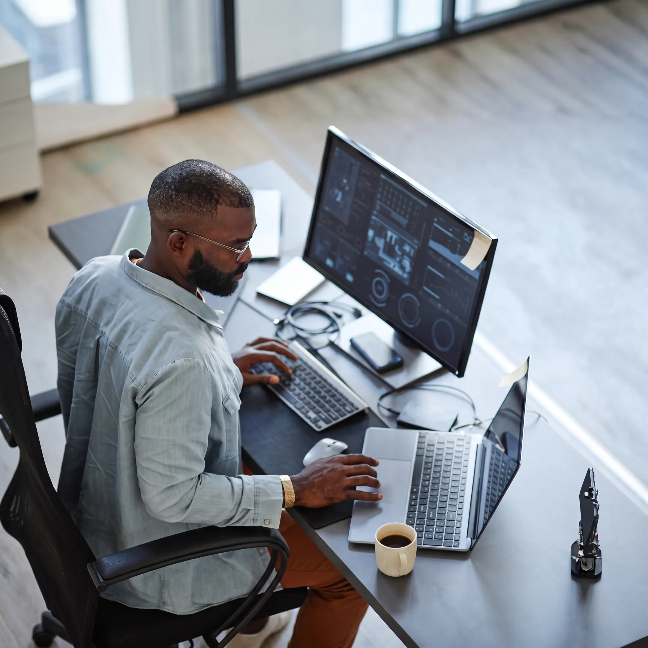 Healthcare IT technician supporting secure clinical technology systems