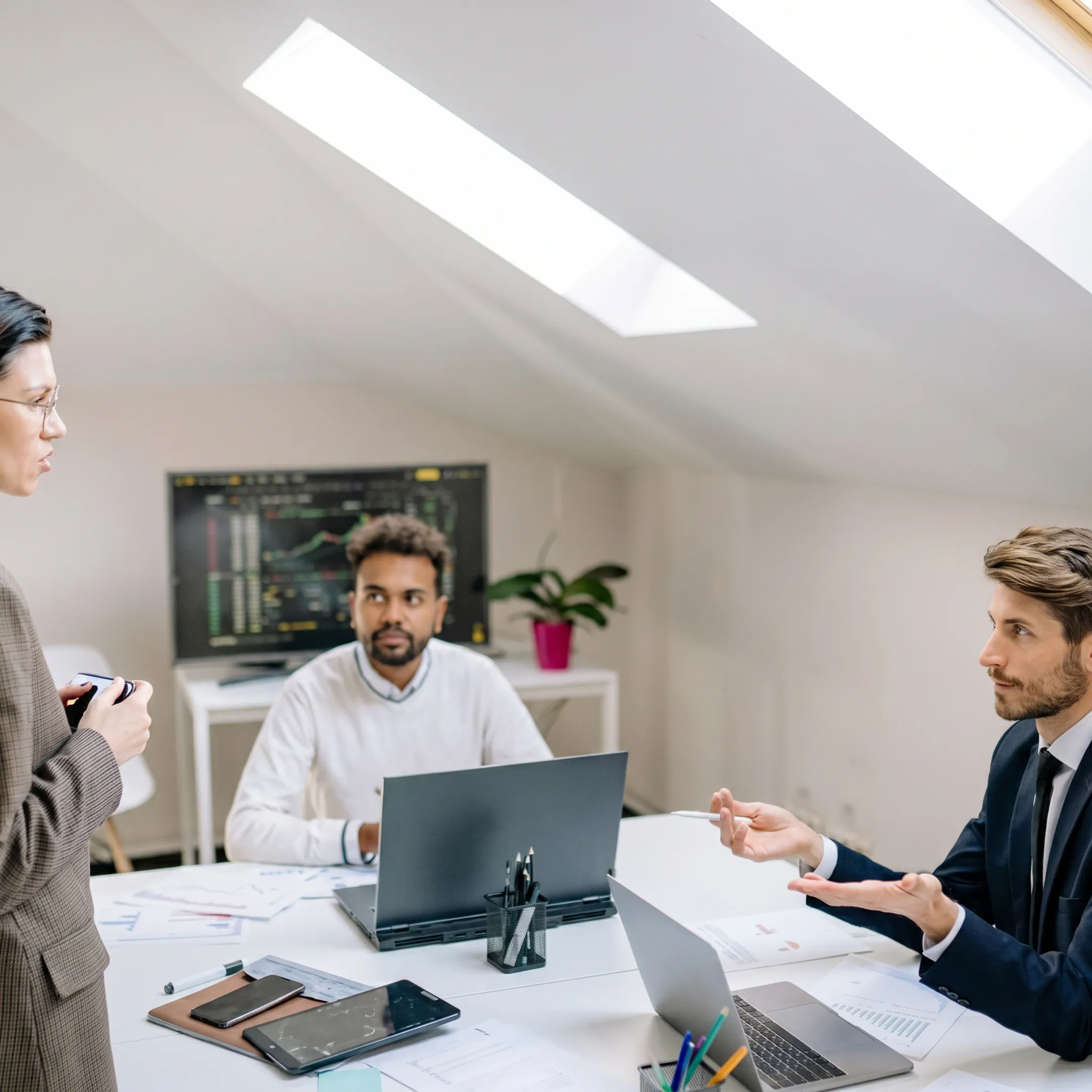 IT specialists reviewing a business data migration plan