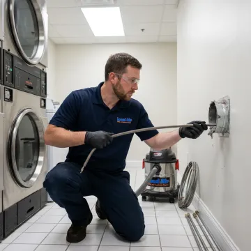 Commercial dryer vent cleaning technician