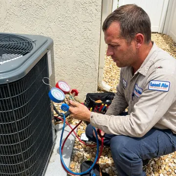 Technician testing HVAC system performance