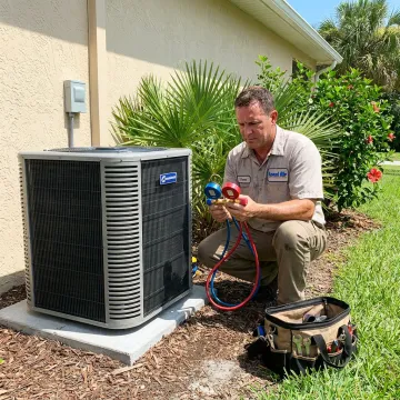 Technician repairing a residential air conditioning system