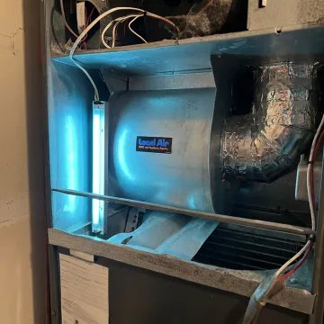 Clean HVAC air handler with UV light installed