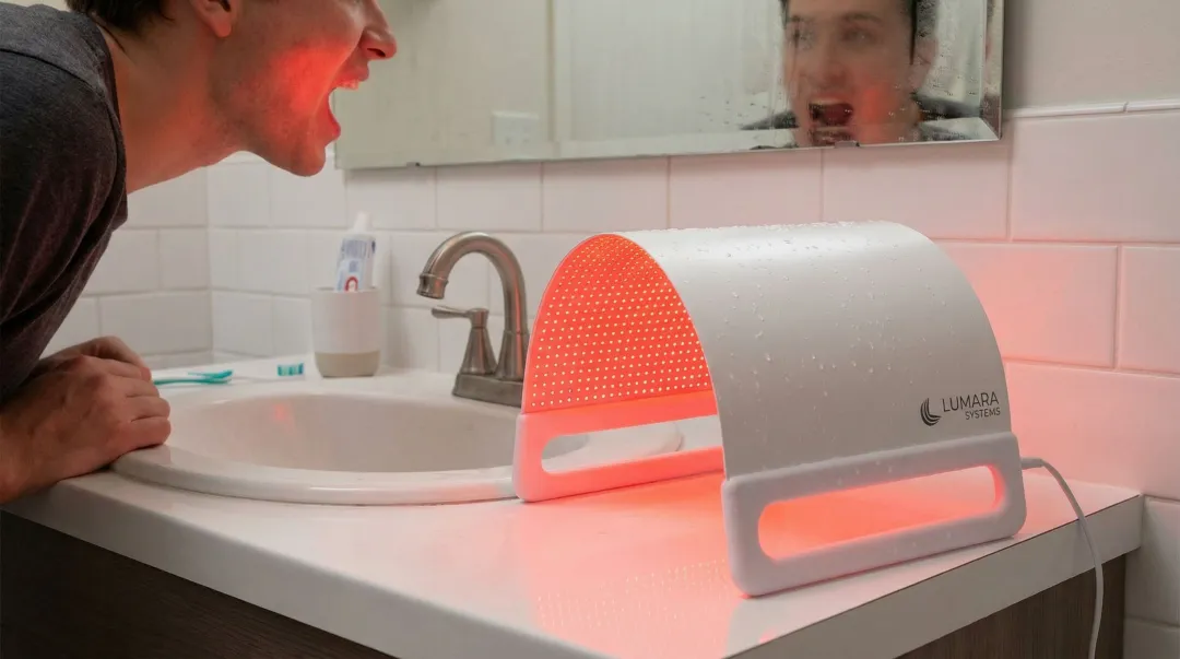 Lumara Systems 660nm red light therapy panel used during at-home oral surgery recovery