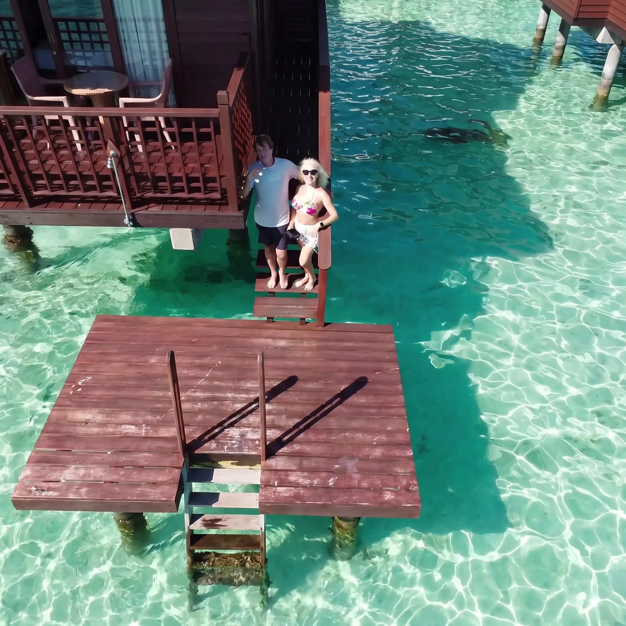 Newlywed couple relaxing on a luxury cruise near Bora Bora