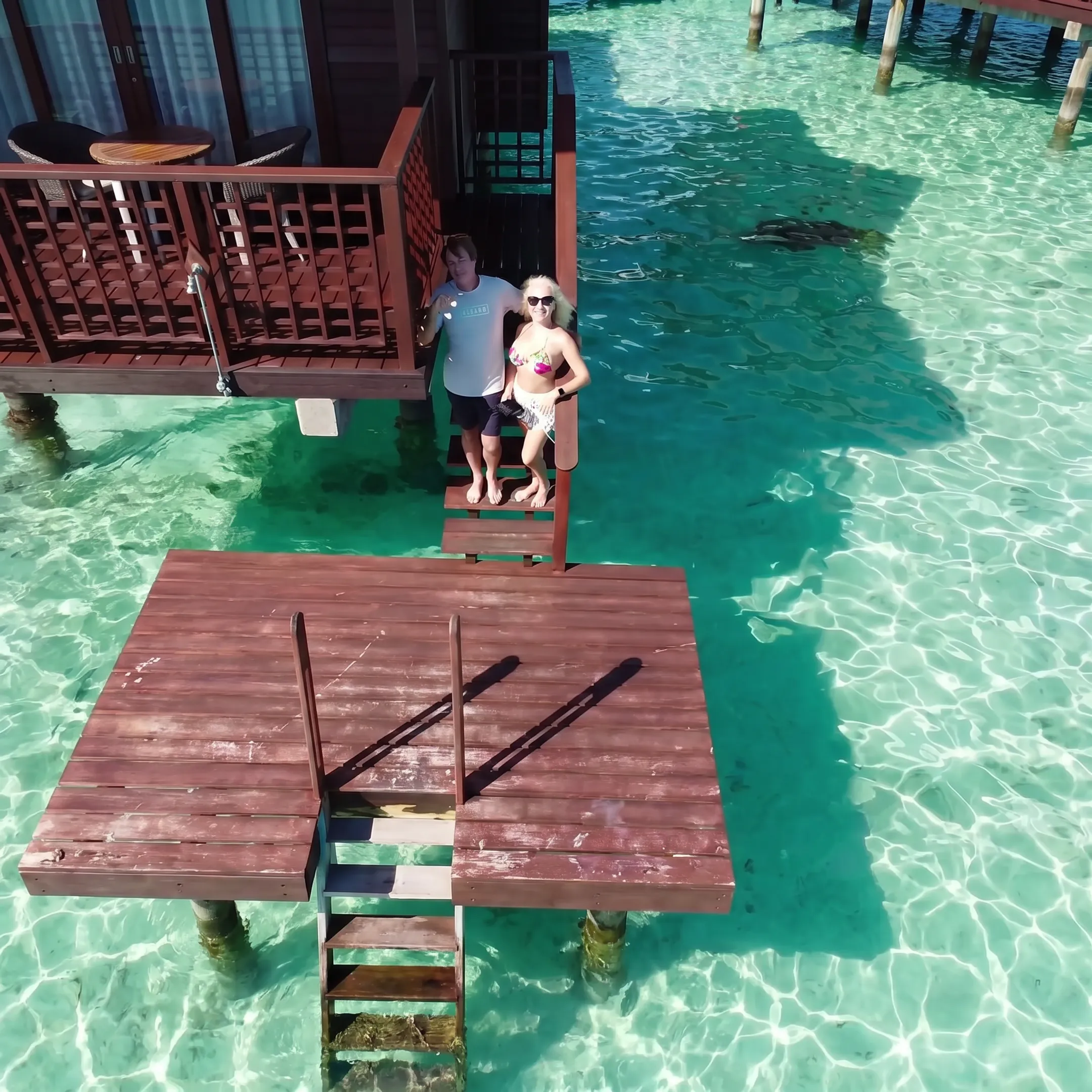 Couple enjoying a French Polynesia resort stay before or after a luxury cruise