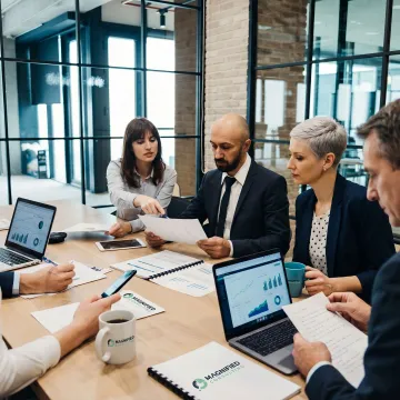 Consultants mapping business strategy with executives